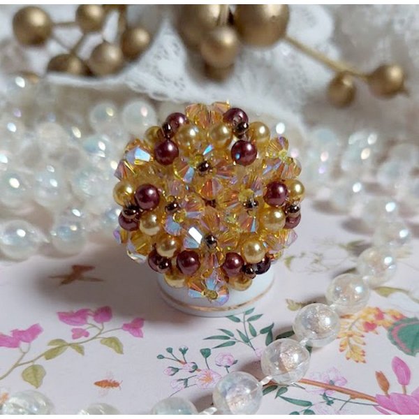 Sunshine ring with facets, pearls and Swarovski crystal spinners