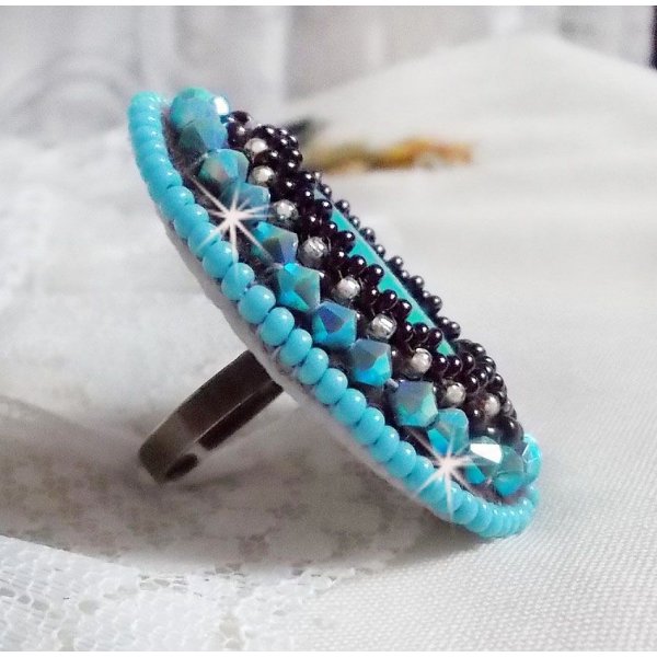 Turquoise ring embroidered with a Turquoise cabochon, PureCrystal spinners and seed beads