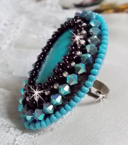 Turquoise ring embroidered with a Turquoise cabochon, PureCrystal spinners and seed beads