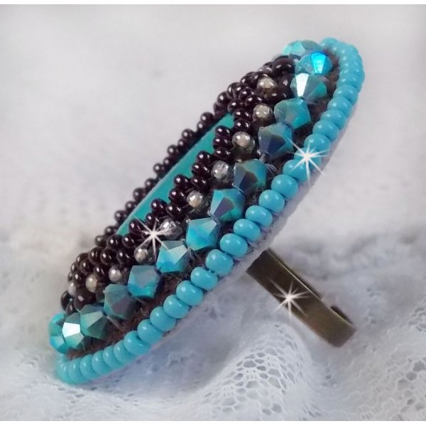 Turquoise ring embroidered with a Turquoise cabochon, PureCrystal spinners and seed beads