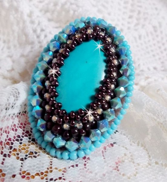 Turquoise ring embroidered with a Turquoise cabochon, PureCrystal spinners and seed beads