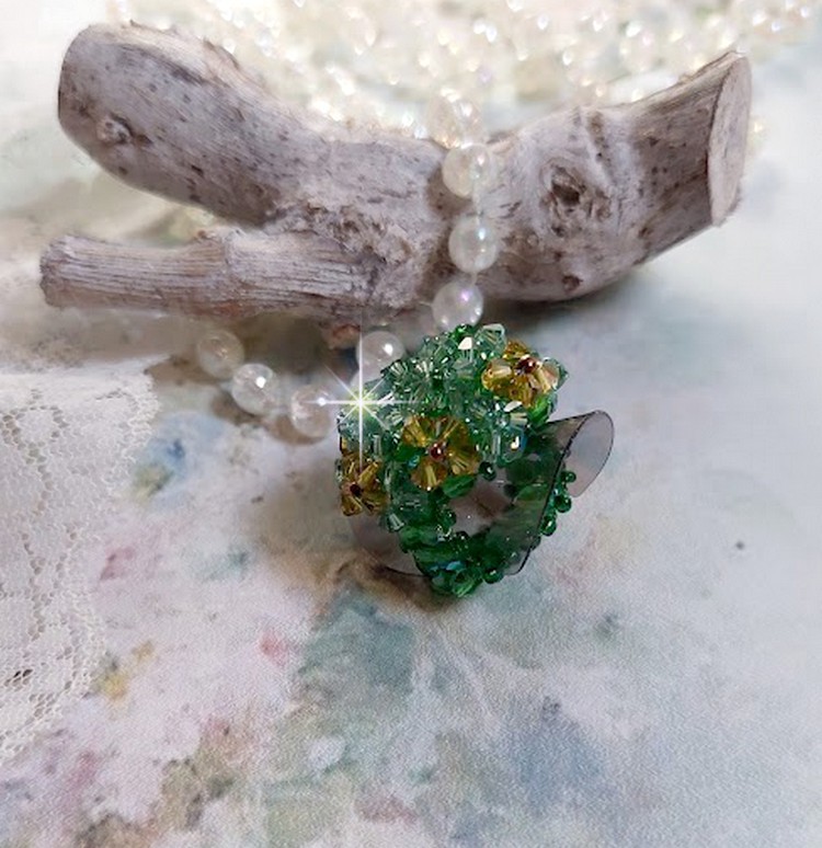 Tender Green Ring with Swarovski crystal facets and spinners