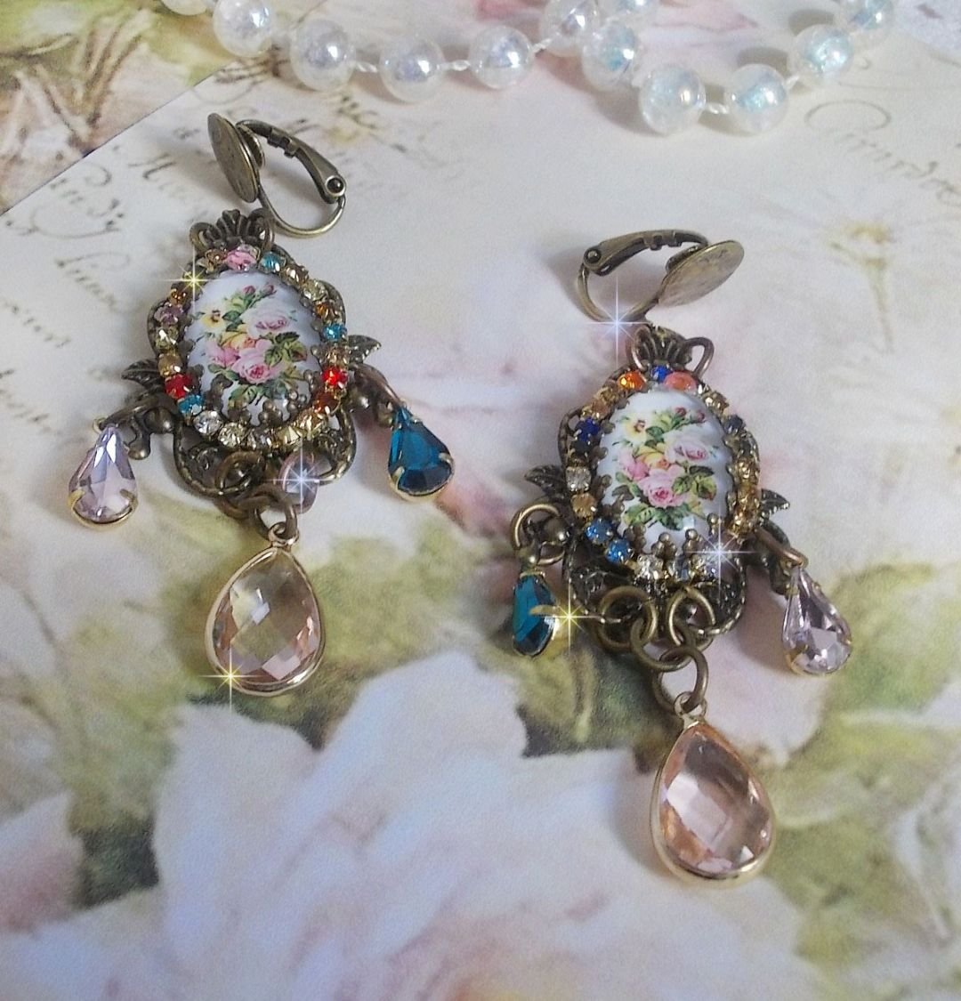 BO Affection of Roses created with glass cabochons representing a bouquet, glass beads, rhinestones of different colors and brass accessories