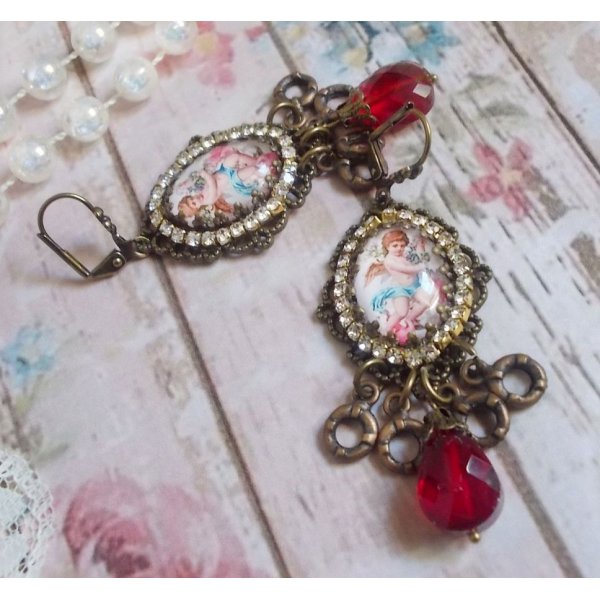 BO Little Angel created with magnifying glass cabochons representing Angels, crystals, charms and glass beads
