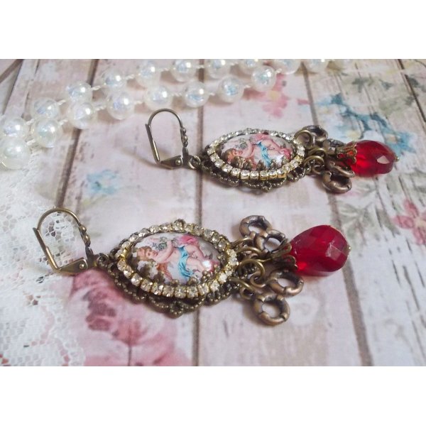 BO Little Angel created with magnifying glass cabochons representing Angels, crystals, charms and glass beads