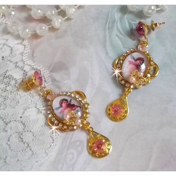 BO Musical Angels created with PureCrystal cabochons, magnifying glass cabochons, stamps and Pink Zirconiums, 