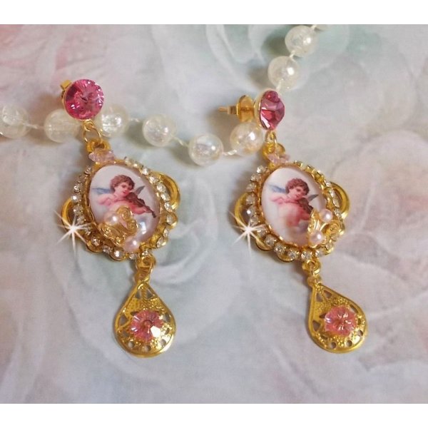 BO Musical Angels created with PureCrystal cabochons, magnifying glass cabochons, stamps and Pink Zirconiums, 