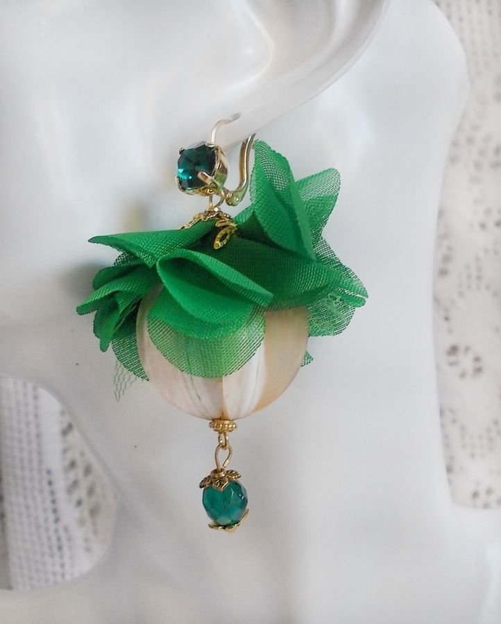 BO Belle Emeraude created with beautiful domed pearls and flowers in green fabric and sleepers