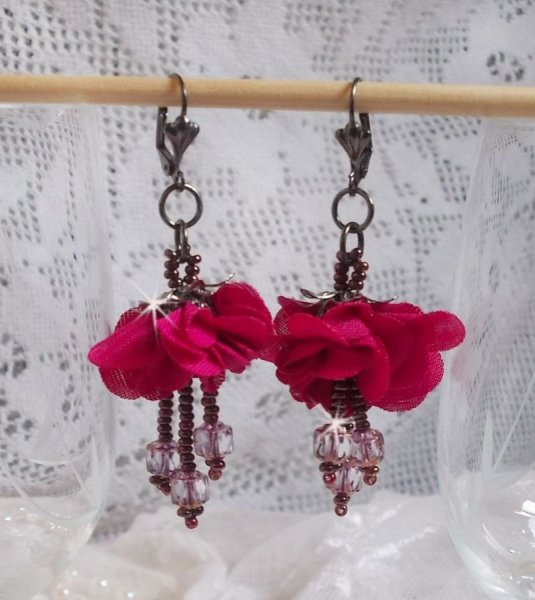 BO Belle H&eacute;l&egrave;ne created with a fuchsia fabric flower, faceted Antique Crystal Bronze and seed beads