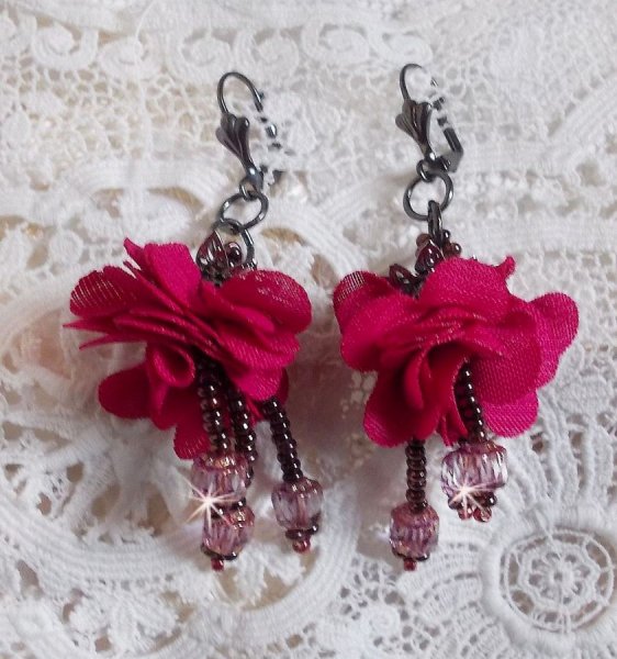 BO Belle H&eacute;l&egrave;ne created with a fuchsia fabric flower, faceted Antique Crystal Bronze and seed beads