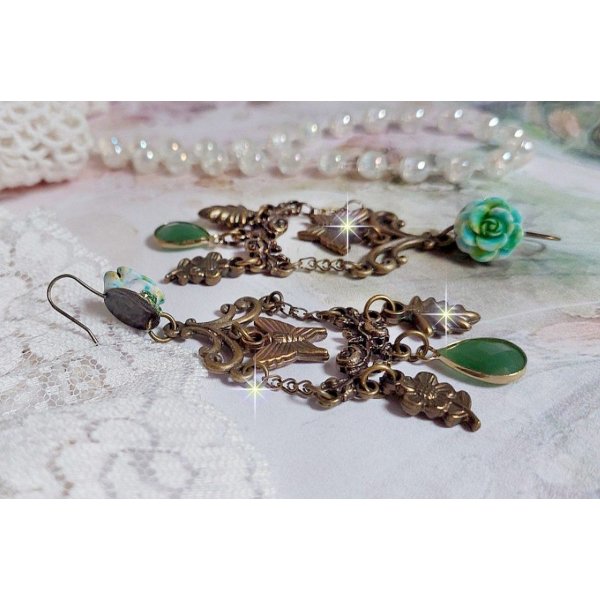 BO Green Palace created with crystals, charms, stamps, pink resin cabochons and faceted glass pendants