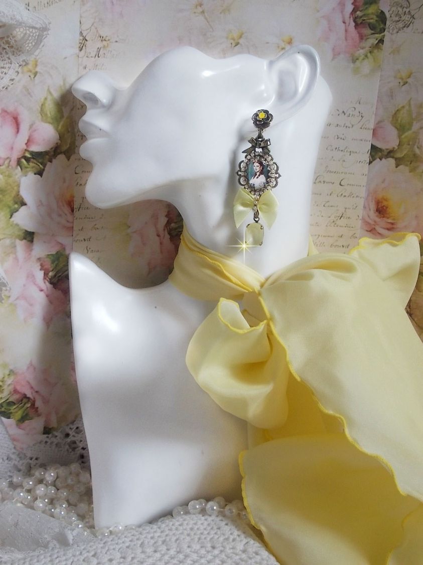 BO Princess look created with cabochons representing a lady princess, crystals, glass beads, bronze accessories and yellow satin bows