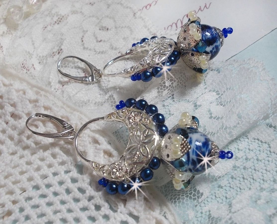 BO Lotus Flowers mounted with Capri Blue/White Venetian Beads and Half Moon Candlestick connectors