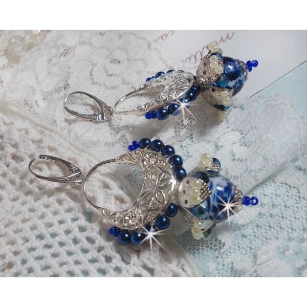 BO Lotus Flowers mounted with Capri Blue/White Venetian Beads and Half Moon Candlestick connectors