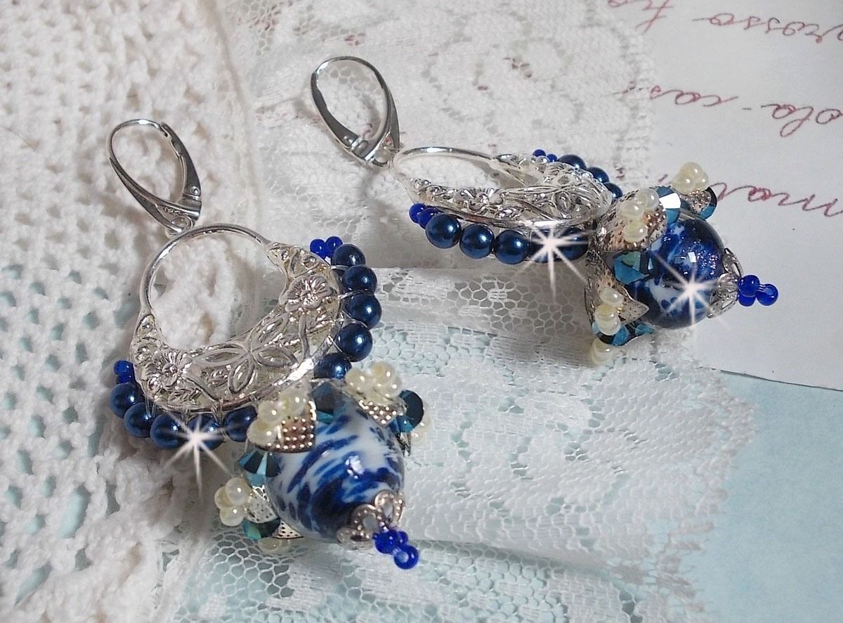 BO Lotus Flowers mounted with Capri Blue/White Venetian Beads and Half Moon Candlestick connectors