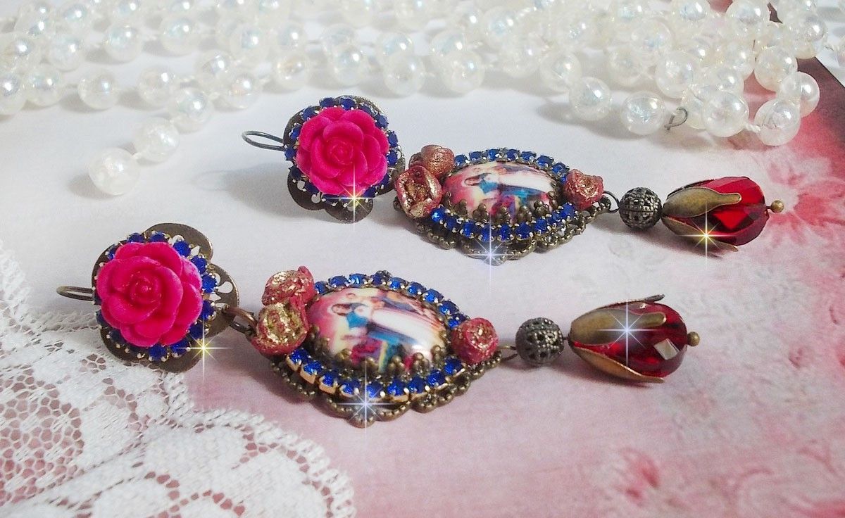 BO Mary and Jesus created with resin cabochons, red faceted pears and various accessories