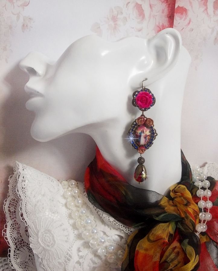 BO Mary and Jesus created with resin cabochons, red faceted pears and various accessories