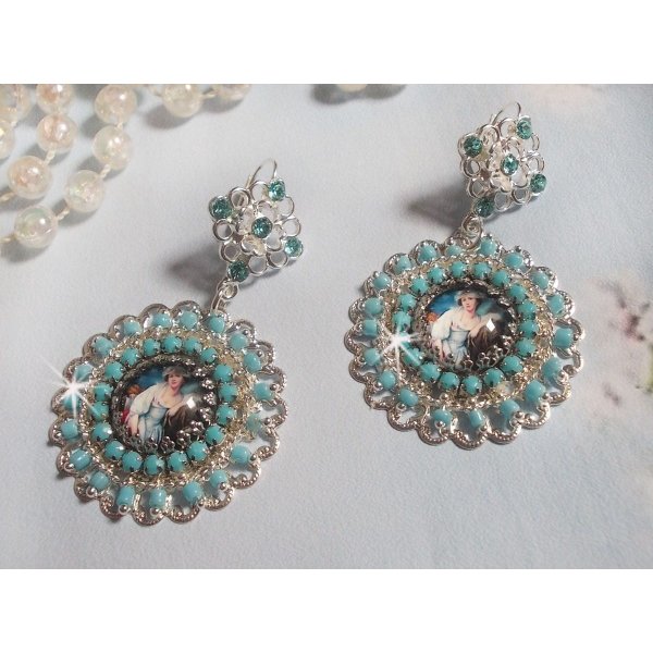 BO Moment de D&eacute;tente created with Vintage Ladies magnifying glass cabochons, Swarovski crystals, stamps and glass beads