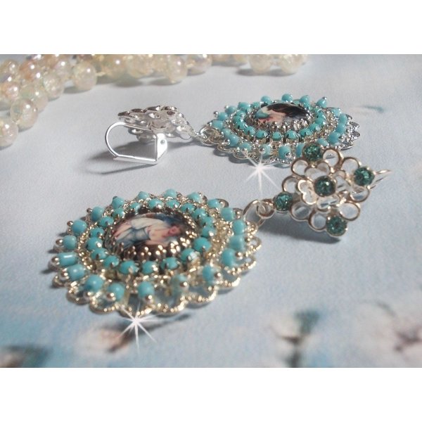 BO Moment de D&eacute;tente created with Vintage Ladies magnifying glass cabochons, Swarovski crystals, stamps and glass beads