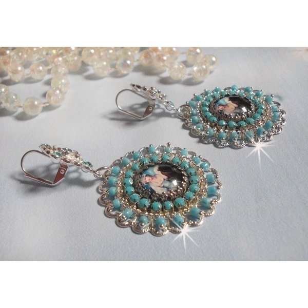 BO Moment de D&eacute;tente created with Vintage Ladies magnifying glass cabochons, Swarovski crystals, stamps and glass beads