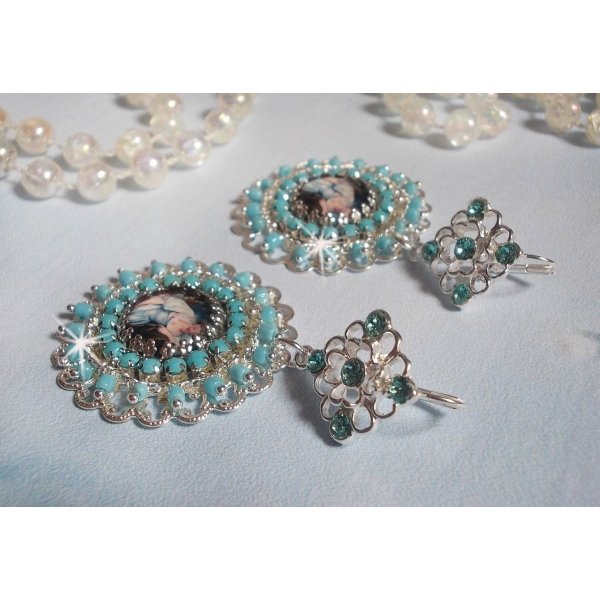 BO Moment de D&eacute;tente created with Vintage Ladies magnifying glass cabochons, Swarovski crystals, stamps and glass beads