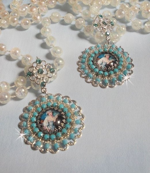 BO Moment de D&eacute;tente created with Vintage Ladies magnifying glass cabochons, Swarovski crystals, stamps and glass beads