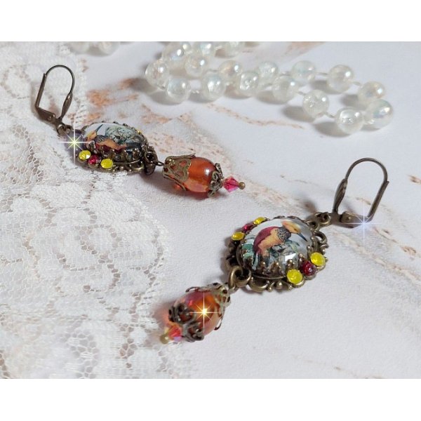 BO Oiseau Huppe ovales et pendantes, cabochons repr&eacute;sentant des oiseaux mont&eacute;es sur pendentifs, gouttes en verre, cabochons en cristal et dormeuses en laiton. Une fa&ccedil;on de voir ce bel oiseau