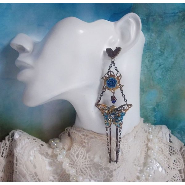 Iridescent butterflies created with Zirconium, Swarovski crystals, Resin cabochons, various accessories and Bohemian glass beads