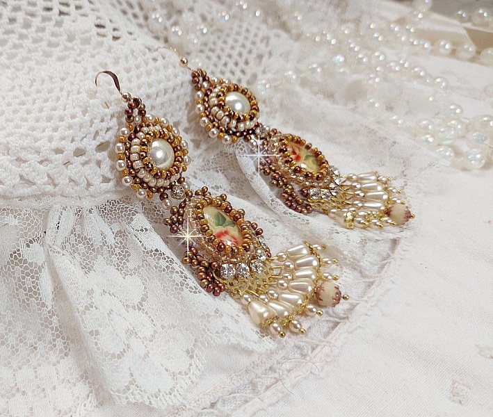 BO Reflets de Ros&eacute;e are embroidered with pearly pearls, Swarovski Crystals and 14K Gold Filled ear hooks.