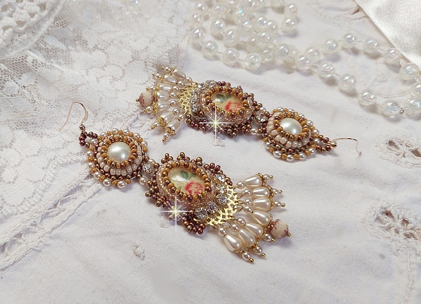 BO Reflets de Ros&eacute;e are embroidered with pearly pearls, Swarovski Crystals and 14K Gold Filled ear hooks.