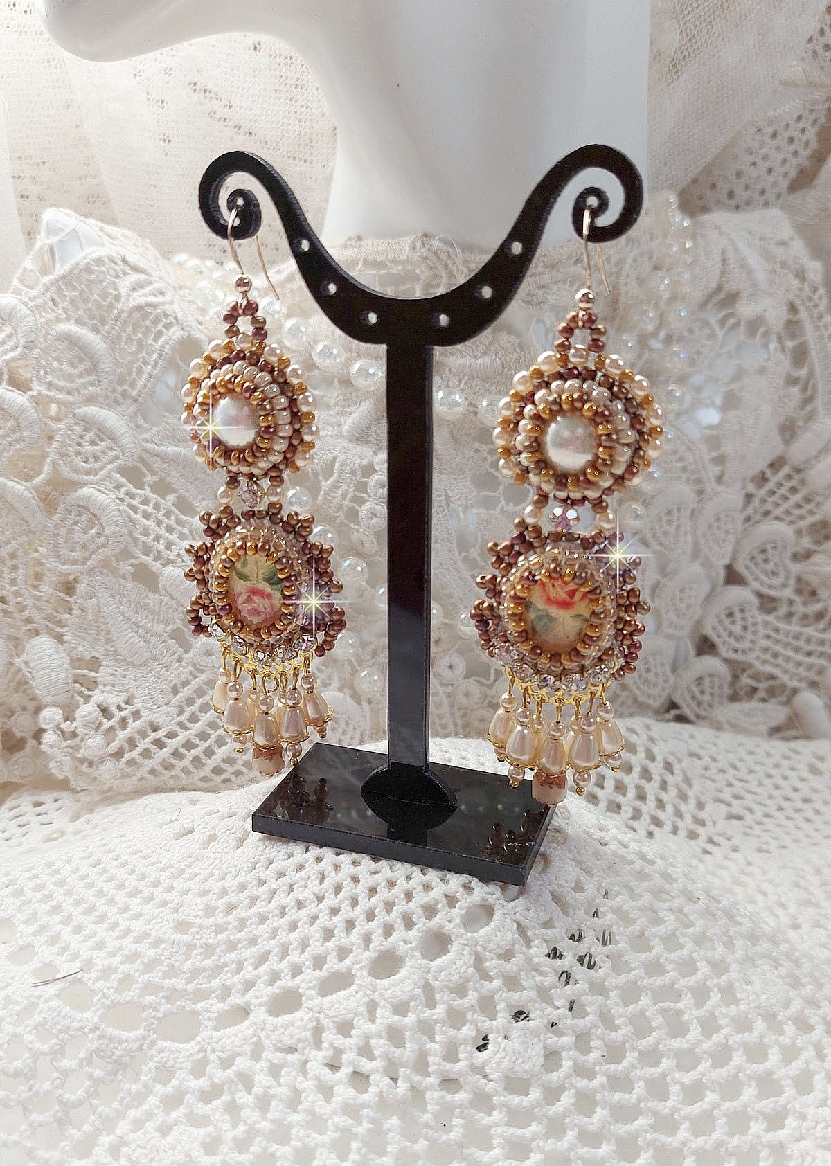 BO Reflets de Ros&eacute;e are embroidered with pearly pearls, Swarovski Crystals and 14K Gold Filled ear hooks.