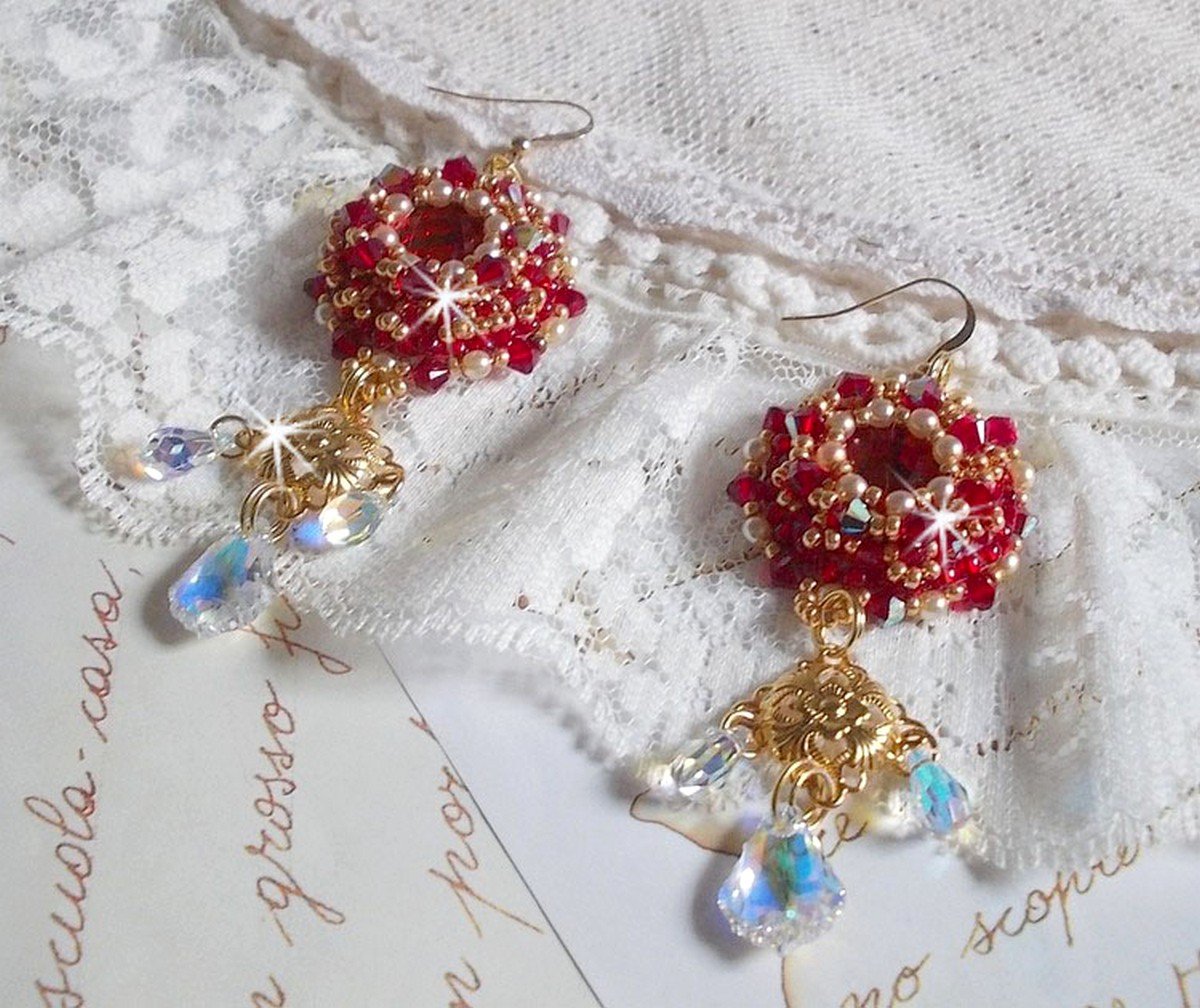 BO Ruby embroidered with Sawarovski crystals, pearly beads, filigree stamps and 14 karat Gold Filled ear hooks