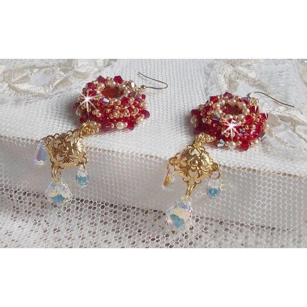 BO Ruby embroidered with Sawarovski crystals, pearly beads, filigree stamps and 14 karat Gold Filled ear hooks