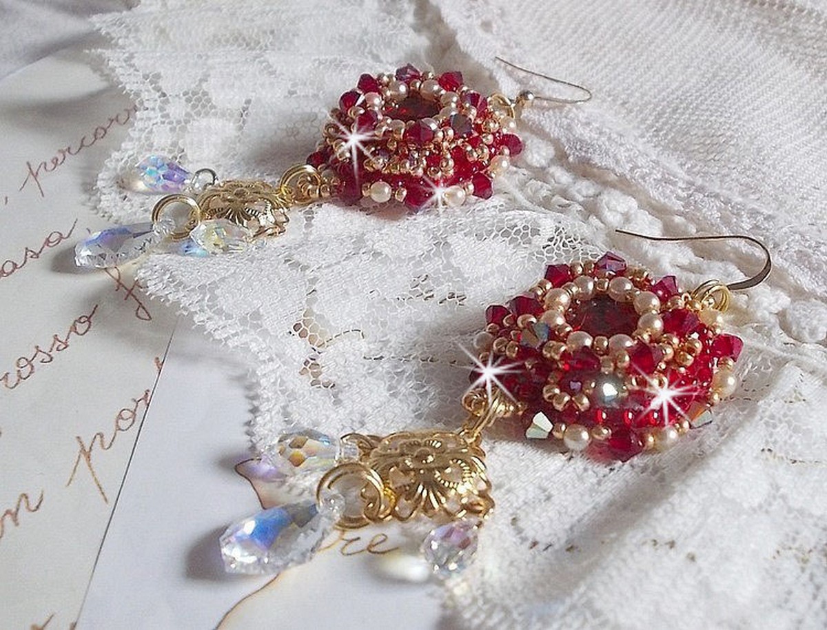 BO Ruby embroidered with Sawarovski crystals, pearly beads, filigree stamps and 14 karat Gold Filled ear hooks