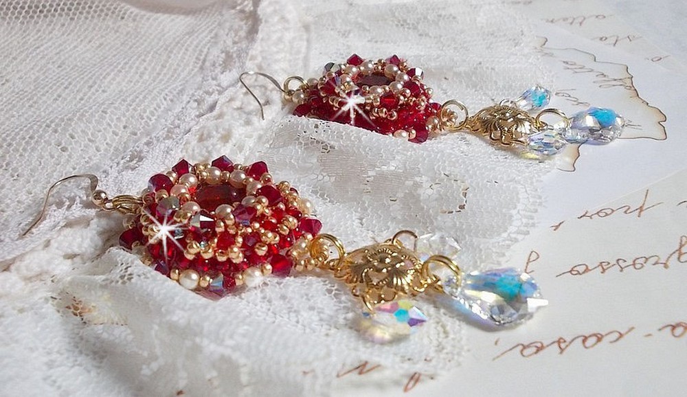 BO Ruby embroidered with Sawarovski crystals, pearly beads, filigree stamps and 14 karat Gold Filled ear hooks