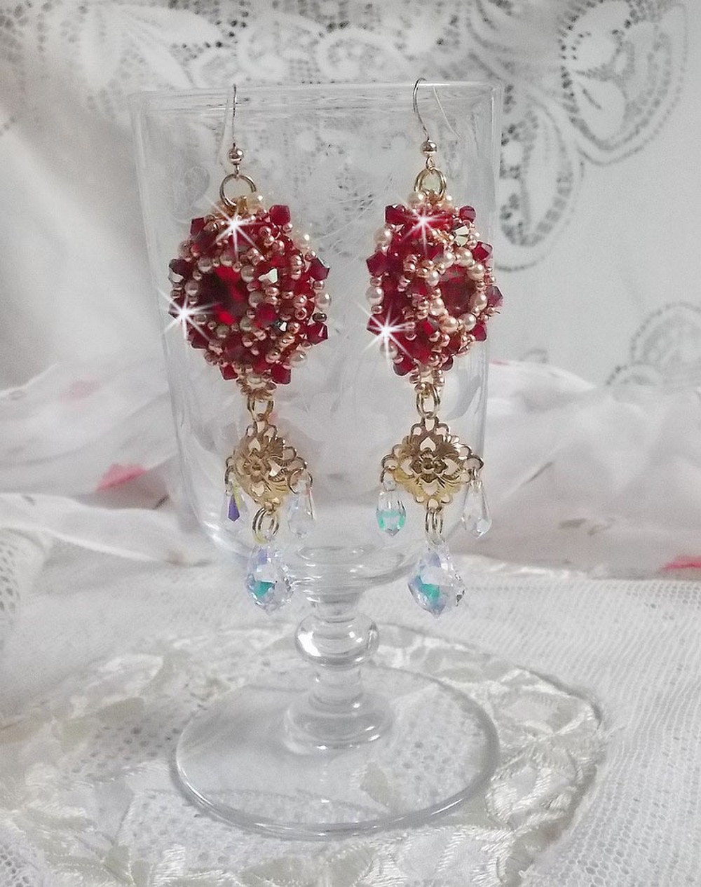 BO Ruby embroidered with Sawarovski crystals, pearly beads, filigree stamps and 14 karat Gold Filled ear hooks