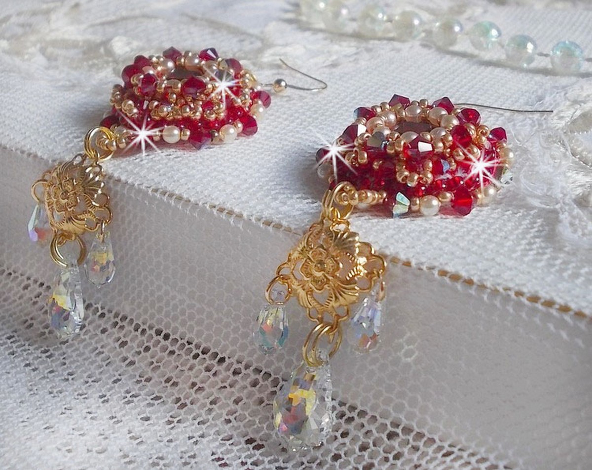 BO Ruby embroidered with Sawarovski crystals, pearly beads, filigree stamps and 14 karat Gold Filled ear hooks