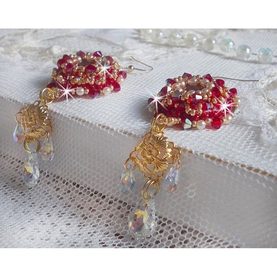 BO Ruby embroidered with Sawarovski crystals, pearly beads, filigree stamps and 14 karat Gold Filled ear hooks