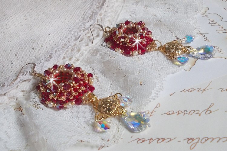 BO Ruby embroidered with Sawarovski crystals, pearly beads, filigree stamps and 14 karat Gold Filled ear hooks