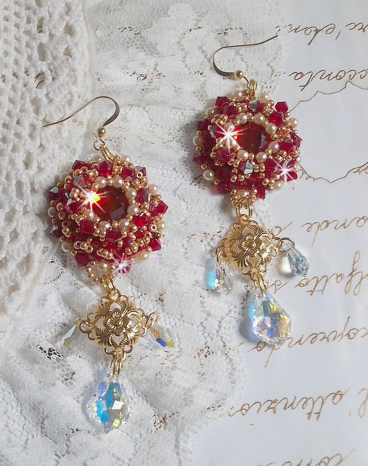 BO Ruby embroidered with Sawarovski crystals, pearly beads, filigree stamps and 14 karat Gold Filled ear hooks