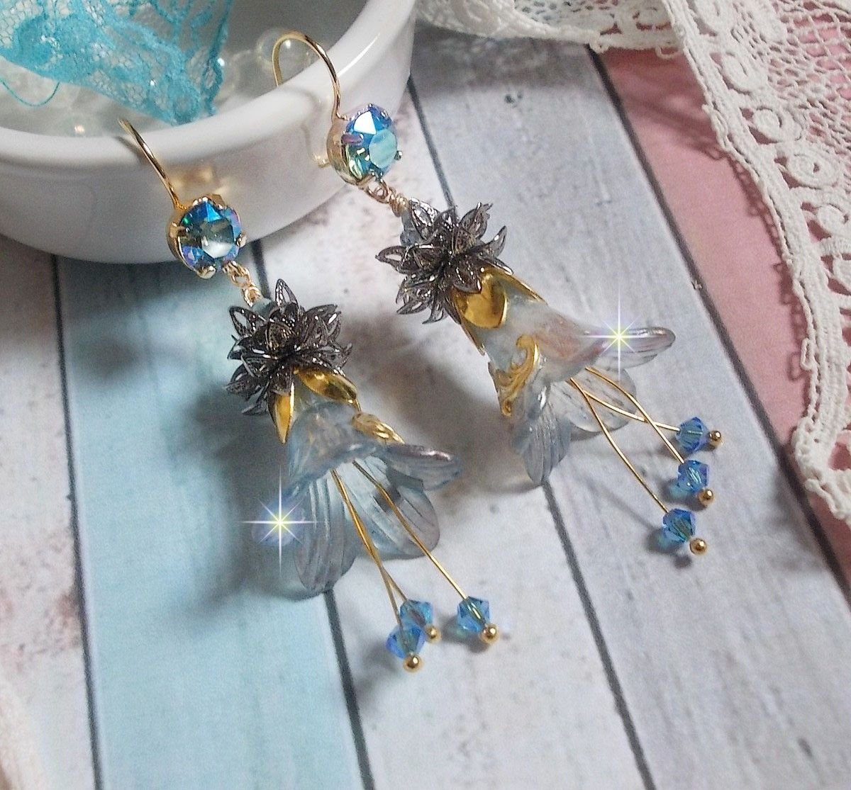 BO Sensations Gold and Blue created with hand painted trumpet flowers, crystals, glass flowers and gold plated accessories