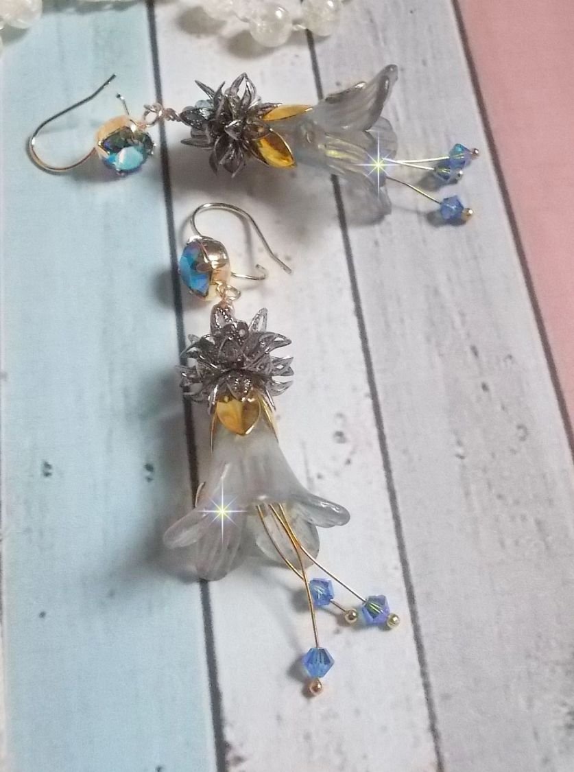 BO Sensations Gold and Blue created with hand painted trumpet flowers, crystals, glass flowers and gold plated accessories