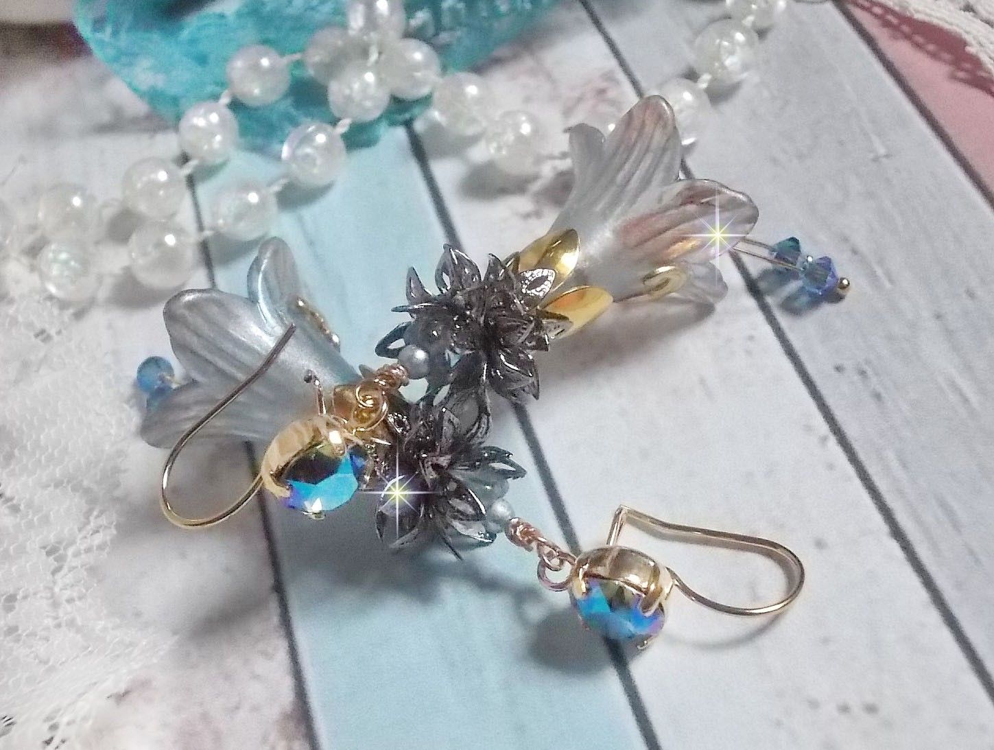 BO Sensations Gold and Blue created with hand painted trumpet flowers, crystals, glass flowers and gold plated accessories