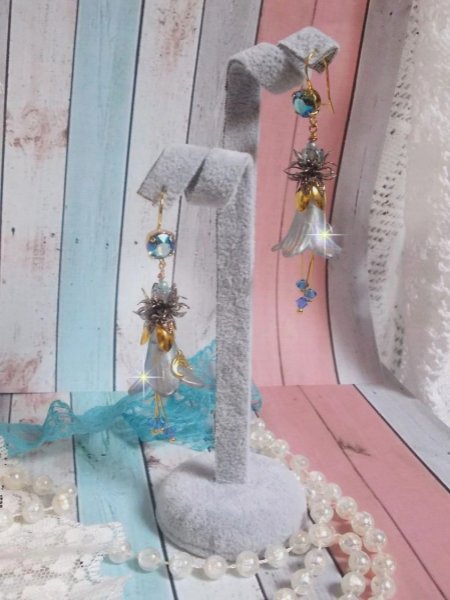 BO Sensations Gold and Blue created with hand painted trumpet flowers, crystals, glass flowers and gold plated accessories