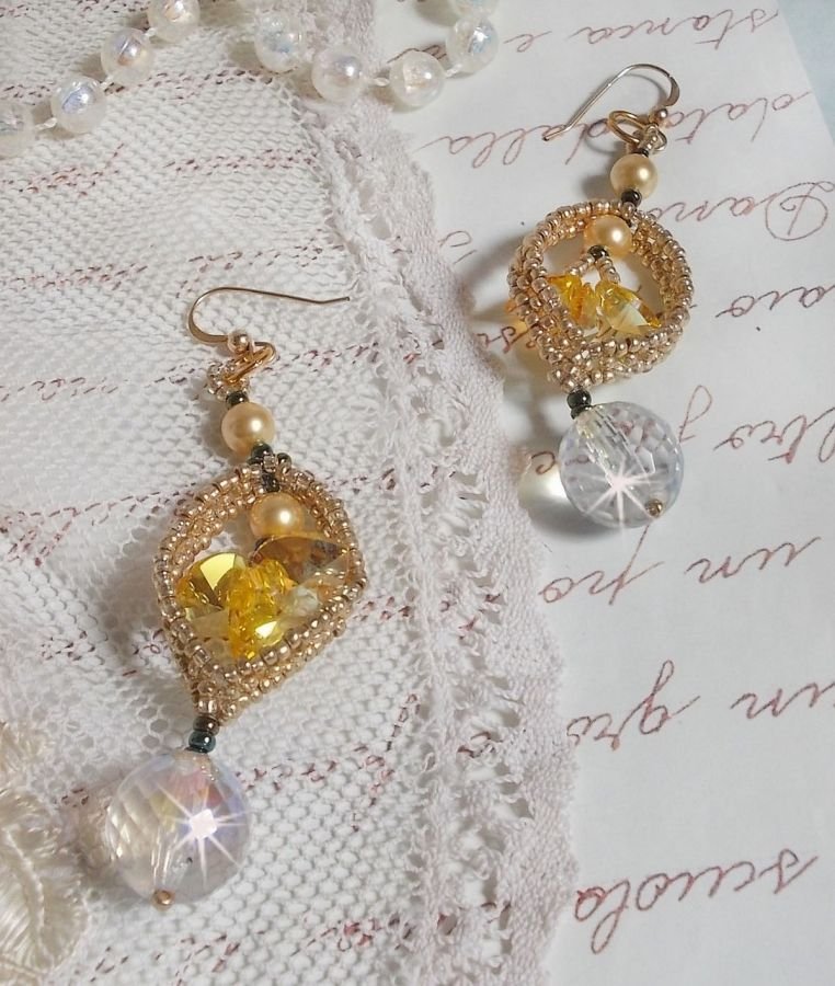 BO Bo'Soleil mounted with Swarovski crystal hearts, Gold pearl beads and 14K Gold Filled ear hooks