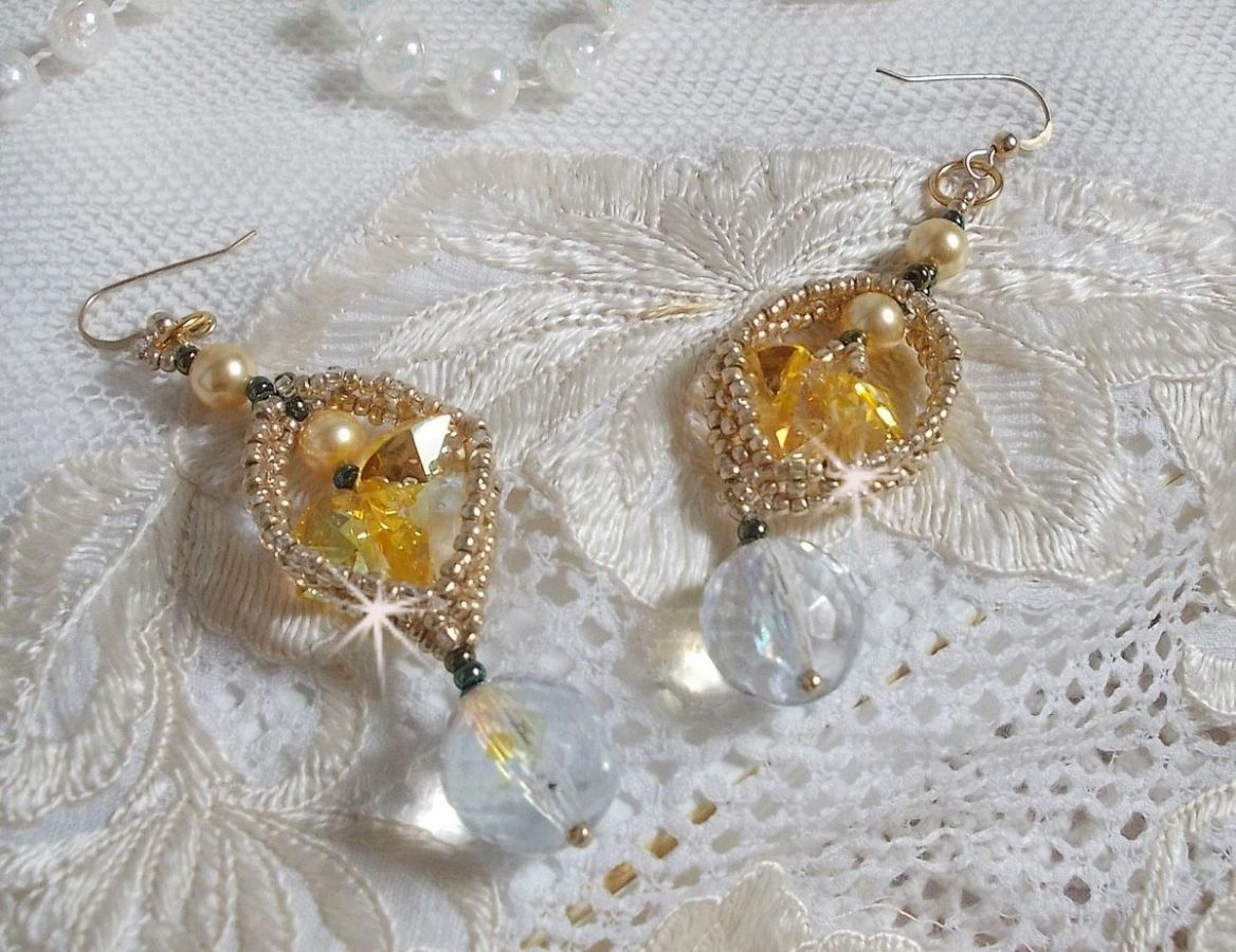 BO Bo'Soleil mounted with Swarovski crystal hearts, Gold pearl beads and 14K Gold Filled ear hooks