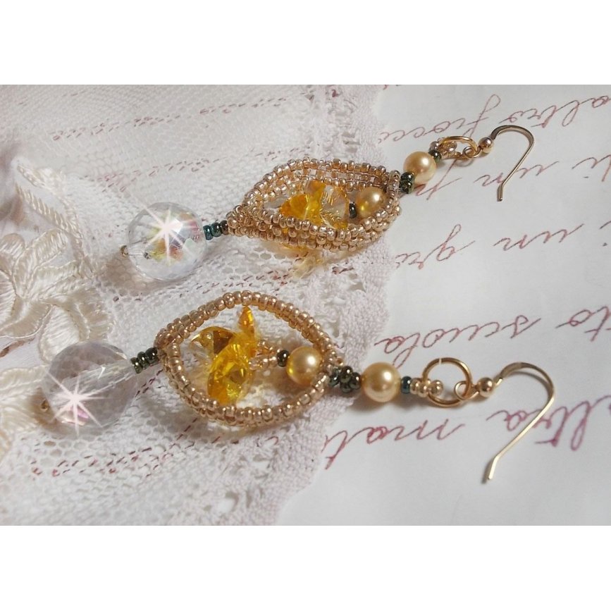 BO Bo'Soleil mounted with Swarovski crystal hearts, Gold pearl beads and 14K Gold Filled ear hooks