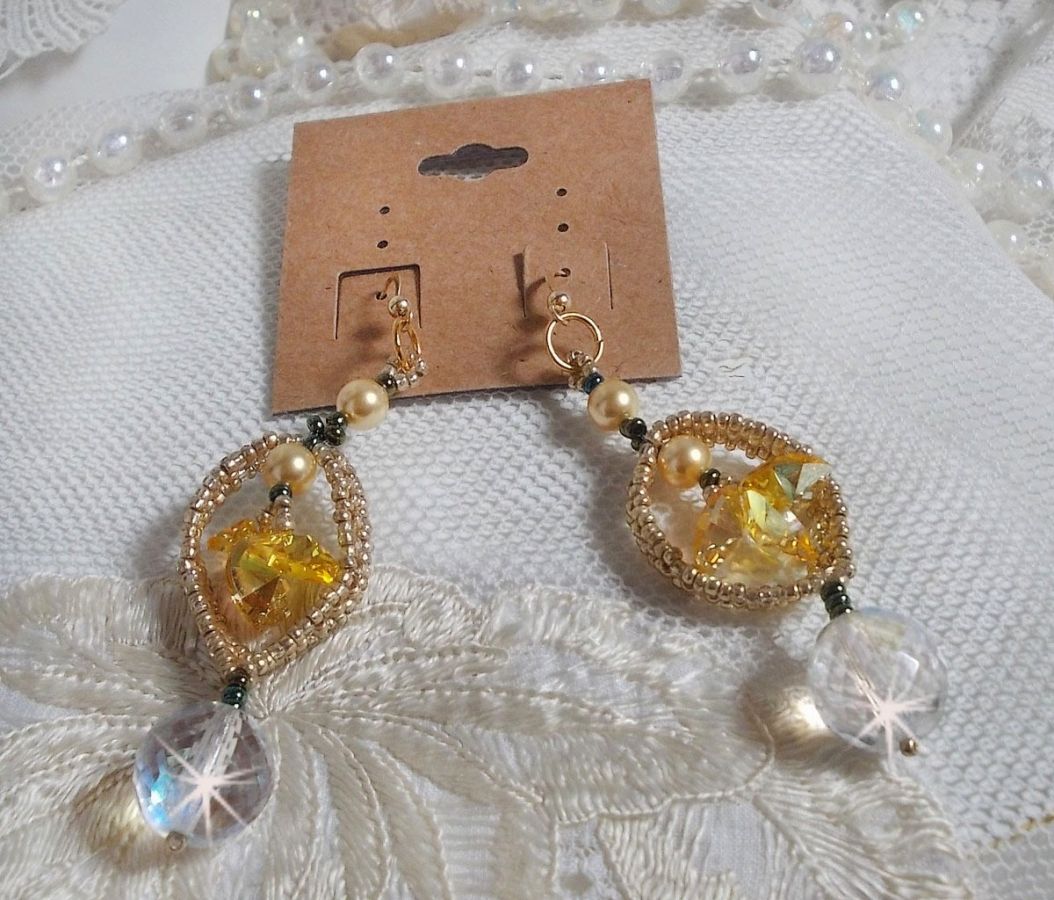 BO Bo'Soleil mounted with Swarovski crystal hearts, Gold pearl beads and 14K Gold Filled ear hooks