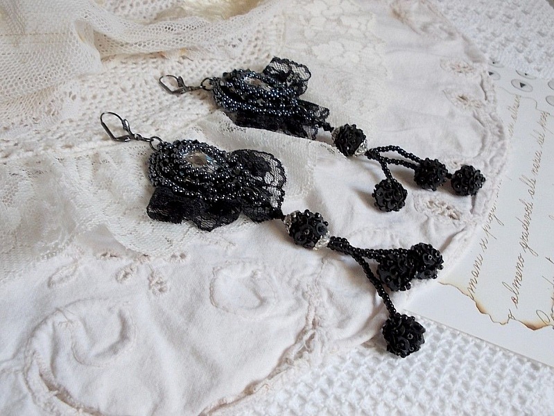 BO Evening wear embroidered with Swarovski crystals, a very old black lace, round beads woven with sequins and seed beads