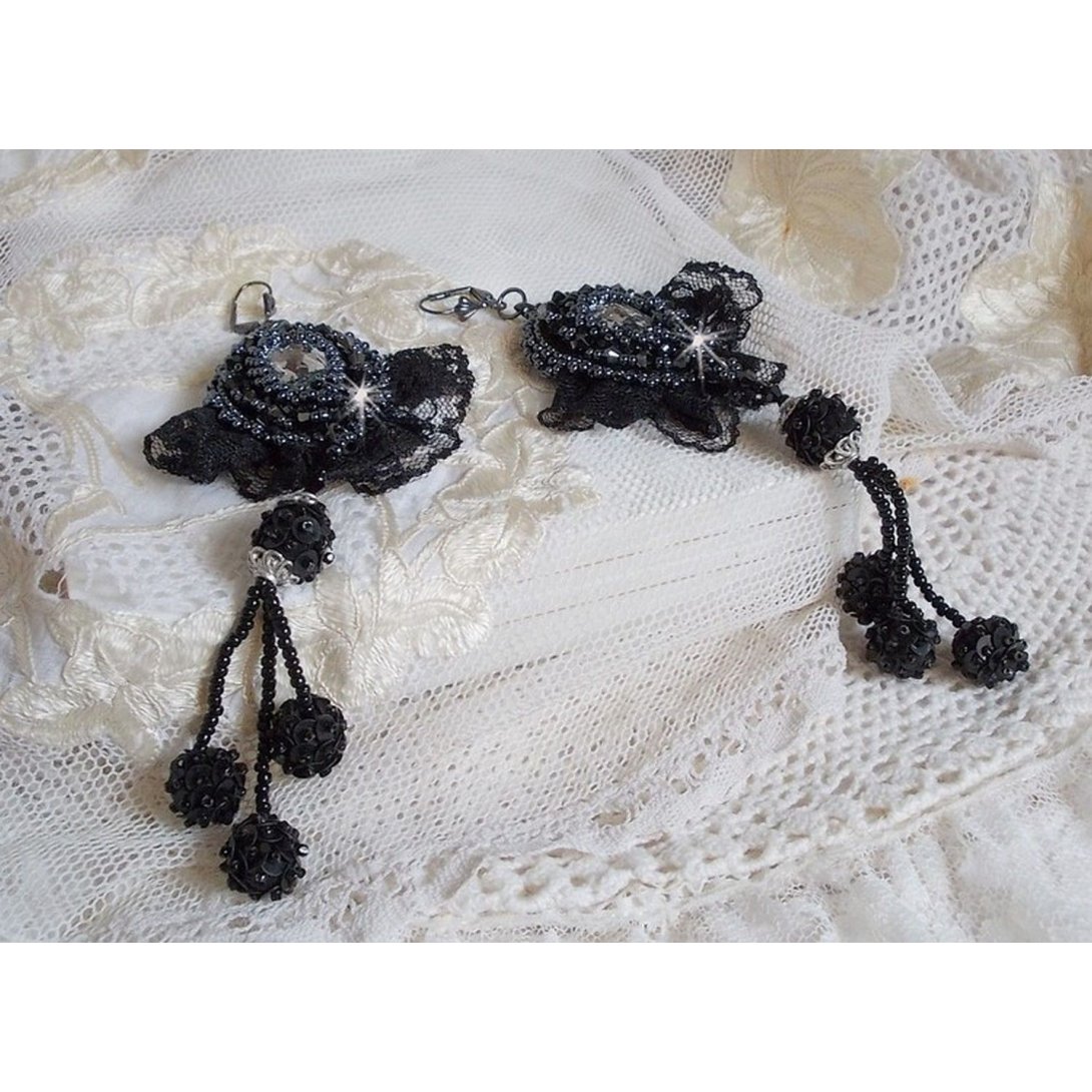 BO Evening wear embroidered with Swarovski crystals, a very old black lace, round beads woven with sequins and seed beads